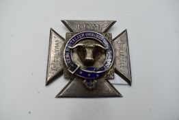 A Silver Medallion in cross form for the Royal Order of Antediluvian Buffaloes with blue enamel,