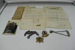 A 9ct Gold Irvin Caterpillar Club Pin with Red Amethyst Eyes, awarded to Kaptain Stanislaw Zygmunt