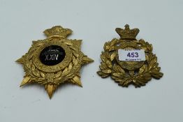 A Other Ranks Shako Plate 1864-81 for 24th Foot and a Shako Plate with black cloth centre 24th