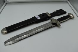 A German Third Reich Red Cross E. M. Dress Hewer,with leather frog, blade with saw back and square