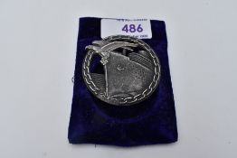 A German WW2 Blockade Runner Badge, marked Fec.Otto Placzek Berlin Ausf Berlin