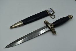A German Third Reich DLV Dagger with black grip and swastika motif, blade F & A Helbig Steinbach,