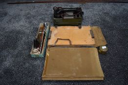 A WW2 British Kharki Map Case, a Military Field Telephone Set L MK1, a piece of brass Royal