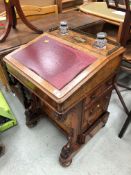 A 19th century antique davenport style writing desk having walnut burr frontage with maple inner