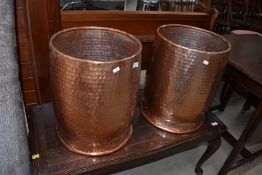 A pair of large planished copper planters, each height approx. 42cm