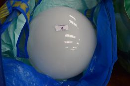 A set of four vintage milk glass globular light shades