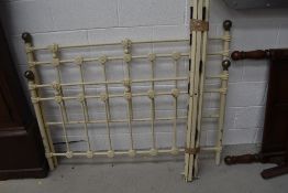 A cast bed frame in the Victorian style, width approx, 144cm