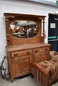 A Victorian stripped mirror back sideboard