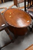 A mid 20th Century walnut tea trolley