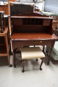A good quality modern, probably Rossmore , desk and stool