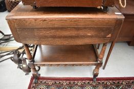 A mid 20th Century oak tea trolley, width approx. 68cm