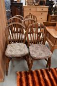 A set of six farm house kitchen chairs having hoop and stick back with yew or elm wood seats