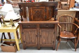 A reproduction oak court cupboard, of small proportions, width approx. 100cm