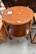 A vintage sapele circular tea trolley