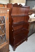 A modern mahogany effect book shelf