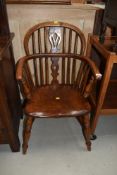A late 18th/early 19th Century beech and elm low windsor chair, of nice proportions, on H stretcher,