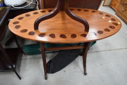 An interesting oval top table, having oyster wood inlay decoration, width approx. 107cm