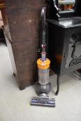 A Dyson DC40 vacuum cleaner
