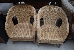 A pair of child's wicker tub chairs