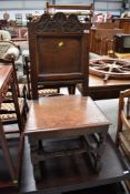 A period oak hall chair having panel and carved back, seat width approx. 48cm