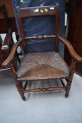 A 19th Century rush seated armchair