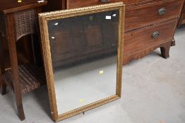 A traditional gilt frame plaster wall mirror, approx. 73 x 55cm