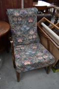 A vintage stained frame armchair