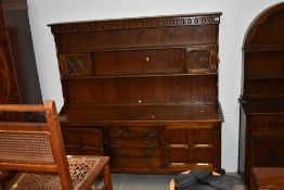 A Priory style oak dresser, width approx. 166cm