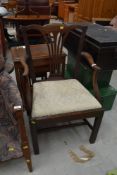A Georgian mahogany armchair in the Hepplewhite style