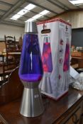 A modern retro styled large size lava lamp with pink purple hues