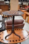 A Victorian oval occasional table having chequer board inlay to top, width approx. 51cm