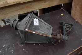 A period style outside light with older cast iron bracket