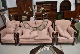 An early 20th Century three piece lounge suite having mahogany frame, good sound frame, some