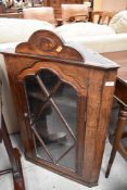 A 19th Century oak corner wall display cabinet
