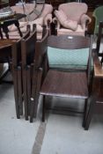 A set of four vintage folding chairs