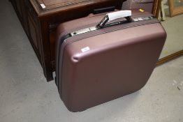 A Samsonite suitcase, mauve