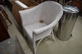 A Lloyd loom tub chair