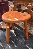 A kidney shaped stool, craftsman made, similar to mouseman but sadly no mouse on this one