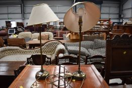 A pair of modern brass table lamps