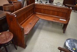 A traditional pine church corner pew etc, dimensions approx 150 x 150cm