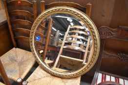 A vintage gilt frame circular mirror, approx. diameter 59cm
