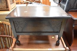 A vintage oak box stool, width approx. 54cm