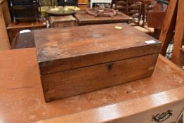 A mahogany writing case with compartmental inners