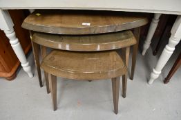 An interesting vintage stained frame nest of triangular tables