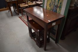 A late 19th/early 20th Century mahogany fold over tea table, on square legs , approx. width 90cm