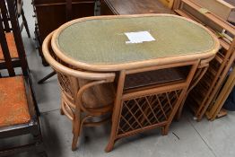 A bamboo framed conservatory breakfast style nest of two chairs and table approx 50cm wide by 100