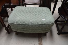 A reproduction upholstered footstool, width approx. 80cm