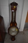 An Edwardian mahogany banjo aneroid barometer, having line and shell inlay decoration , broken