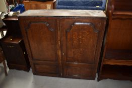 A period oak panelled cupboard, width approx. 90cm depth 24cm