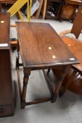 A Priory style oak occasional table, width approx. 69cm